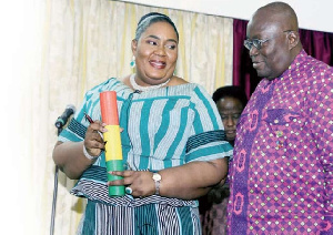 District Assembly Common Fund Admin, Irene Naa Torshie Addo (L) with President Nana Akufo-Addo