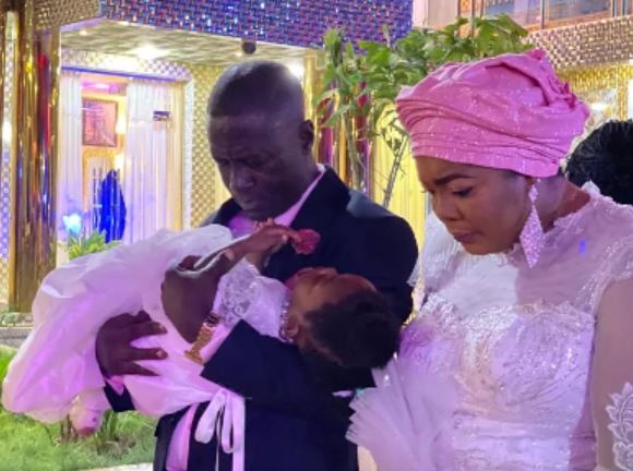 Beautiful photos drop as Captain Smart outdoors his 10th child in grand ceremony