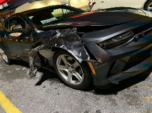 A picture of his car after the accident