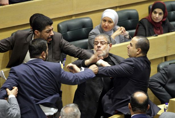 The scuffle broke out between deputies and parliament speaker Abdelkarim al-Daghmi during a debate on an amendment adding the female noun for a Jordanian citizen,