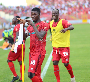 Asante Kotoko captain, Abdul Ismail Ganiyu celebrating a goal