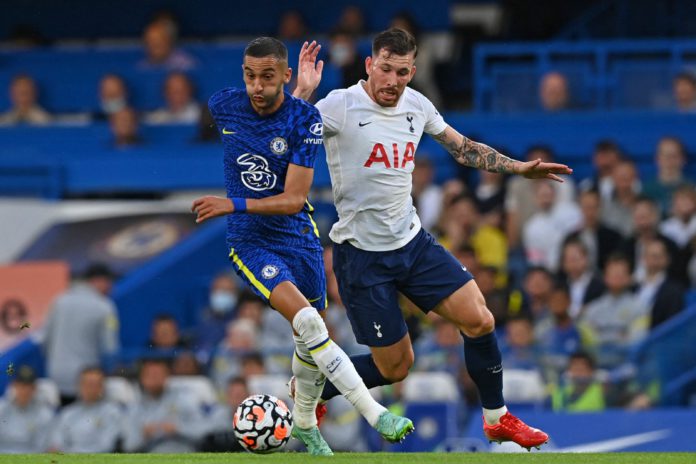 Chelsea's Moroccan midfielder Hakim Ziyech (L) vies with Tottenham Hotspur's Danish midfielder Pierre-Emile Hojbjerg (R) during the pre-season friendly football match between Chelsea and Tottenham Hotspur at Stamford Bridge in London on August 4, 2021. - RESTRICTED TO EDITORIAL USE. No use with unauthorized audio, video, data, fixture lists, club/league logos or 'live' services. Online in-match use limited to 75 images, no video emulation. No use in betting, games or single club/league/player publications. (Photo by Glyn KIRK / AFP) / RESTRICTED TO EDITORIAL USE. No use with unauthorized audio, video, data, fixture lists, club/league logos or 'live' services. Online in-match use limited to 75 images, no video emulation. No use in betting, games or single club/league/player publications. / RESTRICTED TO EDITORIAL USE. No use with unauthorized audio, video, data, fixture lists, club/league logos or 'live' services. Online in-match use limited to 75 images, no video emulation. No use in betting, games or single club/league/player publications. (Photo by GLYN KIRK/AFP via Getty Images)