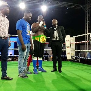 One of Samed's boxers, Osumanu Haruna with the title