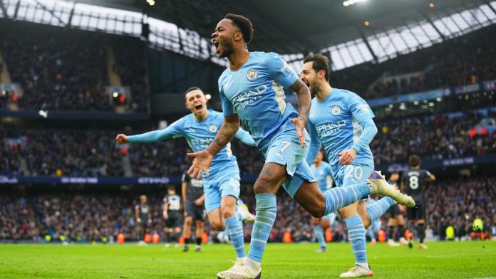 Raheem Sterling of Manchester City celebrates after scoring their side's first goal from the penalty spot during the Premier League match between Manchester City and Wolverhampton Wanderers at Etihad Stadium on December 11, 2021 in Manchester, England Image credit: Getty Images