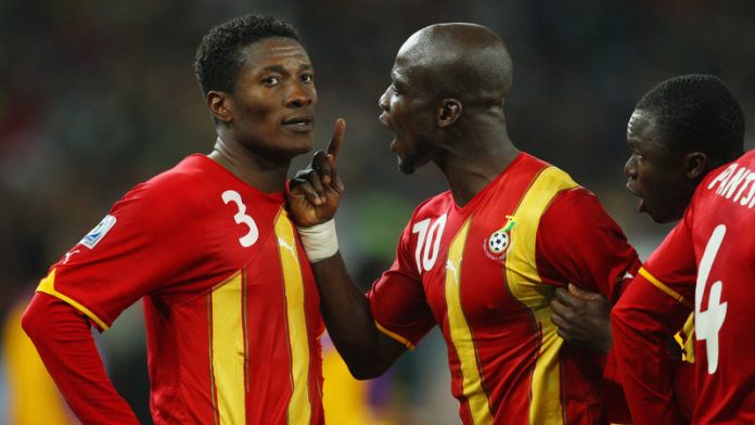 Gyan and Appiah during 2010 World Cup against Quarter-final game against Uruguay