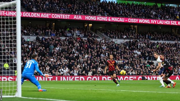 Harry Kane scores for Tottenham against Manchester City