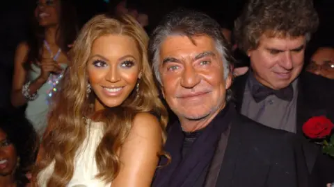 Getty Images Beyonce and Roberto Cavalli at the Metropolitan Museum in 2004