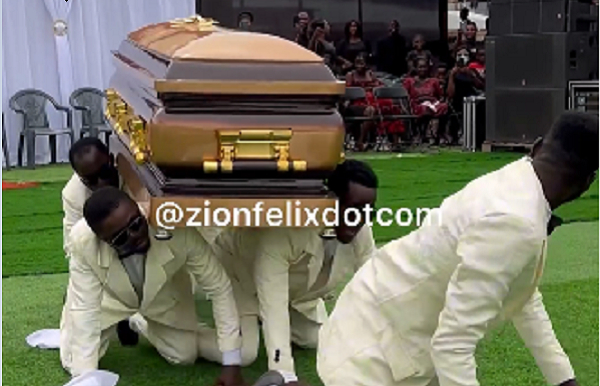 Watch pallbearers’ wild performance with casket at Kuami Eugene’s father’s funeral –