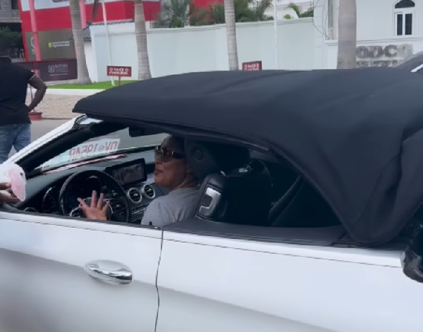 Actress Nikki Samonas storms town with her new convertible Mercedes Benz