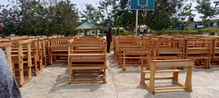Adankwaman SHS Parents Association presents 100 desks to school