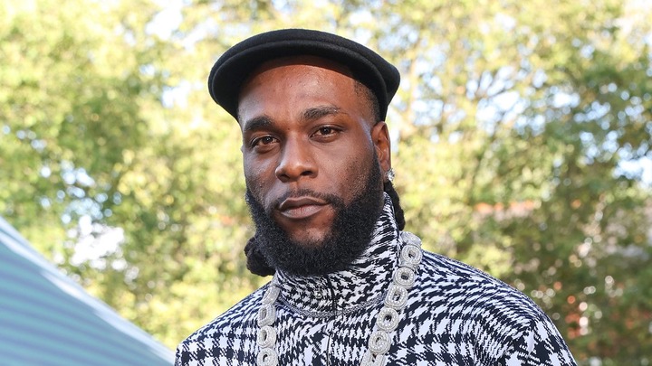 Lady claiming to be baby mama of Cubana Chief Priest claims Burna Boy’s aides forced her to say singer helped her with N30m