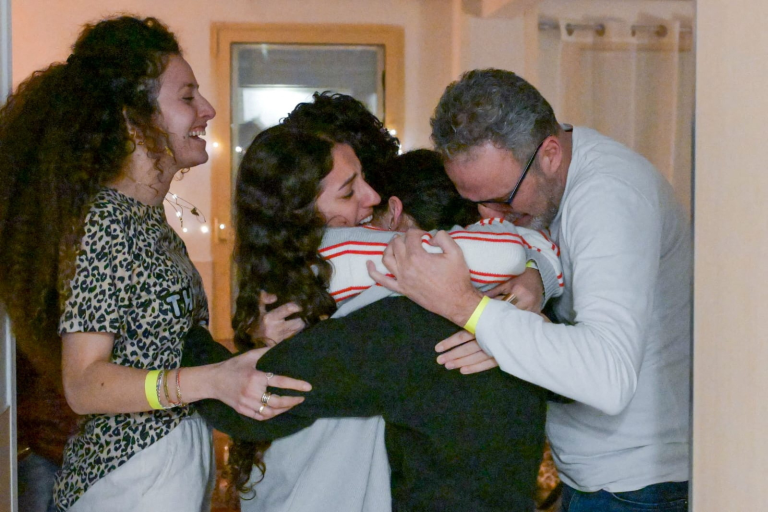 Cheers and weeping as Israelis watch Gaza hostages return