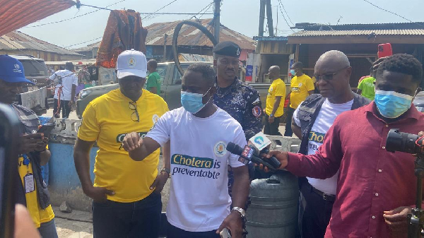 Minister of Health takes to the streets to educate public on cholera outbreak in Winneba