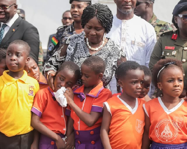 Prof. Opoku-Agyemang ‘comforts’ tearful child at 77th Crossroads Shooting Memorial