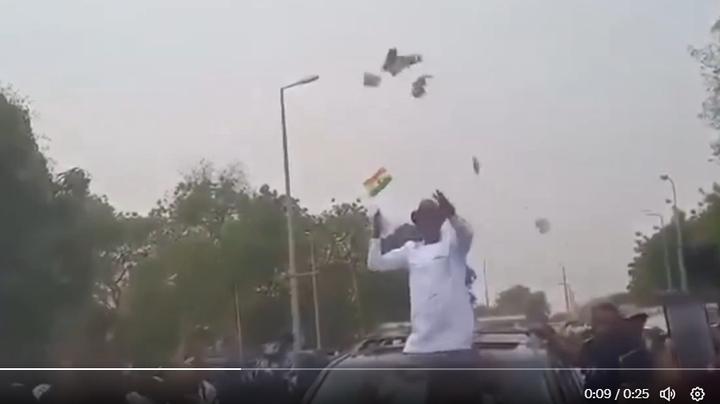 Ghanaians React as Regional Minister-Designate, Hon. Akamuguri Atanga Sprays Cash on Supporters