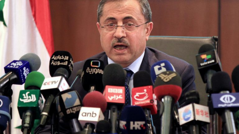 Former Syrian interior minister surrenders to new authorities