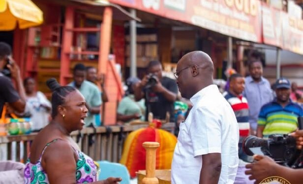 Ato Forson interacts with traders and ‘kayayei’ at Makola ahead of budget presentation