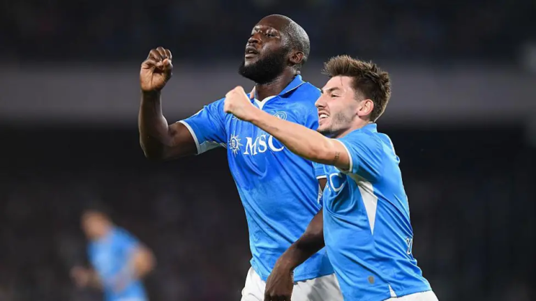 Napoli beat AC Milan to keep pressure on Inter