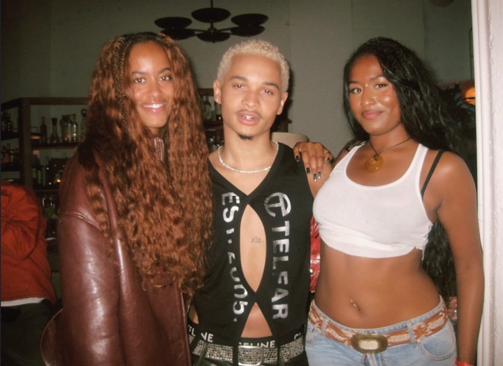 Malia and Sasha Obama look stunning as they pose with singer Destin Conrad at his album listening party