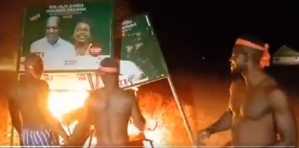 Watch as irate youth in Salaga South burn billboards of MP