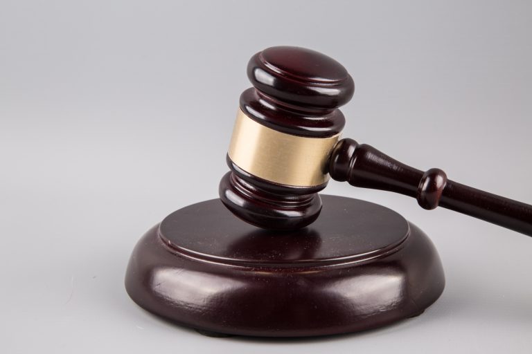Two remanded over robbery, unlawful possession of military attire