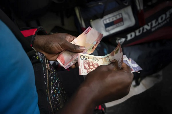 Cedi trades at GH¢12.40 per dollar on interbank market
