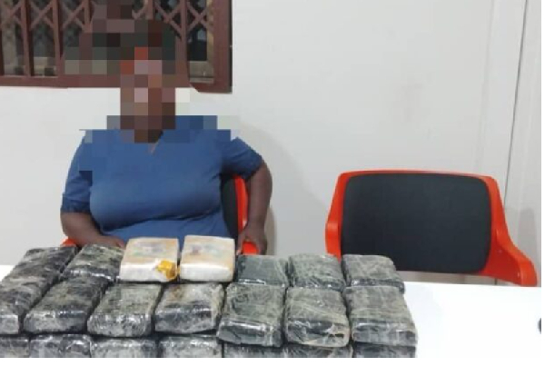 Woman arrested at KIA with 30 slabs of cannabis concealed in cargo
