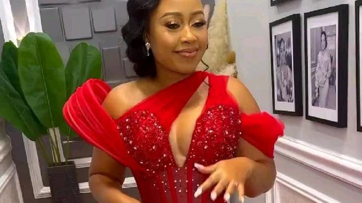 Why Every Stylish Woman Needs a Red Lace Dress in Her Closet This Year