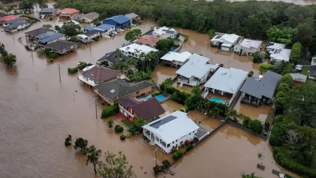 Four dead, several missing in record Australia flooding