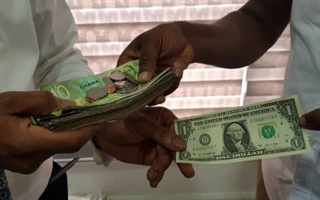 Fitch revises end-year cedi projection to GH₵13 per dollar