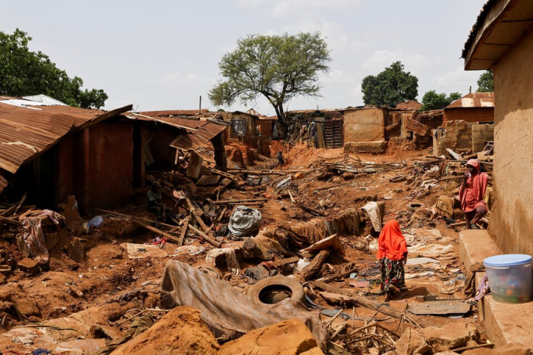 Nearly 100 missing a week after floods tore through Nigerian town