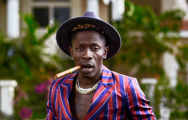 Shatta Wale pushed down by fan during performance in Kumasi