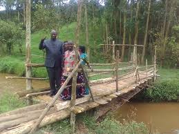 Ugandan Politician facing criticism for showing off a wooden bridge he repaired for his constituents