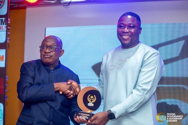 Godwin-Bobobee-DCE-Asuogyaman-receives-his-award-from-Mr-Simon-Osei-Mensah-former-Ashanti-Regional-M.jpeg
