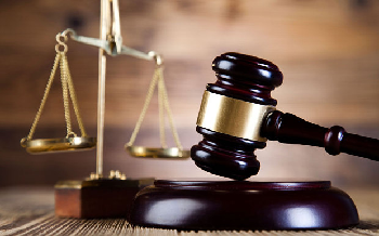 Pastor granted bail over alleged assault on trader